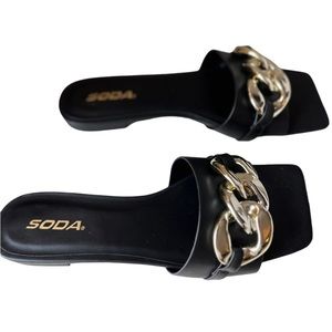 Soda black slip on sandals with large gold chain link accent Size 9 NWOT